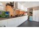 Garage with extensive storage cabinets, a workspace, and organized equipment at 17220 Countrybrook Ln, Orlando, FL 32820