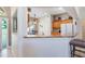 Kitchen with a breakfast bar and stainless steel appliances at 17220 Countrybrook Ln, Orlando, FL 32820