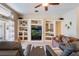 Bright living room featuring a built-in entertainment center and comfortable seating at 17220 Countrybrook Ln, Orlando, FL 32820