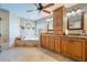 This expansive main bathroom features a tub, a shower, and a double vanity at 17220 Countrybrook Ln, Orlando, FL 32820