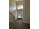 Inviting two story foyer with lots of light and luxury vinyl plank flooring at 178 Chippendale Ter, Oviedo, FL 32765