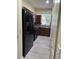Well-designed kitchen offering ample counter space, dark cabinets, and modern appliances at 178 Chippendale Ter, Oviedo, FL 32765
