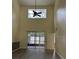 Bright living area showcasing soaring ceilings, a modern ceiling fan, and neutral walls at 178 Chippendale Ter, Oviedo, FL 32765