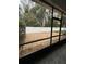 Enclosed patio with gray tiled flooring and brick paved outdoor living space at 178 Chippendale Ter, Oviedo, FL 32765