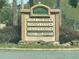 Osprey Cove community sign showcasing the community's golf course and neighborhood names at 1923 Willow Wood Dr, Kissimmee, FL 34746
