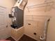 Neat laundry room with shelving, mechanicals, and washer/dryer hookups at 1923 Willow Wood Dr, Kissimmee, FL 34746