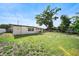 Large grassy backyard, perfect for outdoor activities and relaxation at 2311 Ashland Blvd, Orlando, FL 32808