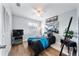 Cozy bedroom with a ceiling fan, a large window, and a closet for ample storage at 2311 Ashland Blvd, Orlando, FL 32808