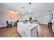 Open kitchen layout flows into the living room, offering seamless entertaining space at 2311 Ashland Blvd, Orlando, FL 32808