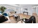Inviting living room with natural light, hardwood floors, and stylish furnishings at 2311 Ashland Blvd, Orlando, FL 32808