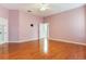 Spacious bedroom with hardwood floors and natural light at 24515 Bocage Way, Leesburg, FL 34748