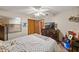 Cozy bedroom with ceiling fan, closet, and window for natural light at 2696 Orange Peel Ct, Orlando, FL 32806