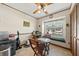Eat-in kitchen with decorative window and a view to the outside at 2696 Orange Peel Ct, Orlando, FL 32806