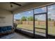 Back porch featuring outdoor furniture and a view of the fenced yard, perfect for relaxation at 2720 Bancroft Blvd, Orlando, FL 32833