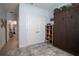 Well-lit bedroom with a view into the hallway, showing a built-in murphy bed and plenty of storage at 2720 Bancroft Blvd, Orlando, FL 32833