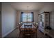Comfortable dining room with wood table, seating for eight, chandelier, and cabinet for storage at 2720 Bancroft Blvd, Orlando, FL 32833