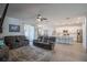 Open-concept living area with kitchen island and comfortable seating, perfect for entertaining and Gathering gatherings at 2720 Bancroft Blvd, Orlando, FL 32833