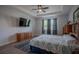 Spacious primary bedroom featuring neutral walls, a ceiling fan, and a decorative area rug at 2720 Bancroft Blvd, Orlando, FL 32833