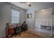 Functional home office space with desk, chairs, and a view of the front entryway at 2720 Bancroft Blvd, Orlando, FL 32833