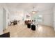 Inviting living room with tile floors, ceiling fan, and comfortable seating arrangement at 305 Hope Cir, Orlando, FL 32811