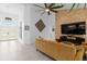 Spacious living room showcasing an accent wall and an inviting layout at 30912 Fairvista Dr, Tavares, FL 32778