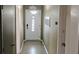 Inviting foyer with a decorative front door, neutral walls, and tiled flooring at 3243 Little Sound Dr, Orlando, FL 32827