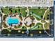 Aerial view showcases the lush landscaping, inviting pool, and shuffleboard courts of the community at 325 N Causeway # 2080, New Smyrna Beach, FL 32169