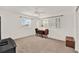 Cozy bedroom with neutral carpet and window views at 325 N Causeway # 2080, New Smyrna Beach, FL 32169