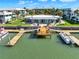 Boat dock area on waterfront showing pier and boats moored to dock, for the condo community at 325 N Causeway # 2080, New Smyrna Beach, FL 32169