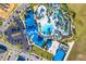 Aerial view of a resort pool with lazy river, basketball court, and other amenities at 3320 Lilac Way, Davenport, FL 33897