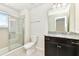 Granite sink and shower in bathroom at 3320 Lilac Way, Davenport, FL 33897