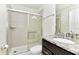 Bathroom featuring a shower and granite vanity at 3320 Lilac Way, Davenport, FL 33897