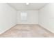 Bright, neutral bedroom with a window that provides natural light at 3320 Lilac Way, Davenport, FL 33897