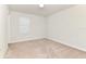 Neutral bedroom with a large window that provides natural light at 3320 Lilac Way, Davenport, FL 33897