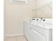 Convenient laundry room with modern washer and dryer at 3320 Lilac Way, Davenport, FL 33897