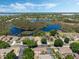 Overhead shot of a residential neighborhood with lakeside homes with private docks and swimming pools at 3655 Seminole Dr, Orlando, FL 32812