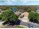 Pictureseque aerial shot of two homes with mature trees and a beautiful lake in the background at 3655 Seminole Dr, Orlando, FL 32812