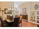 Elegant dining room with hardwood floors, a chandelier, and space for a large dining table at 3655 Seminole Dr, Orlando, FL 32812