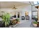 Covered patio with comfortable seating areas and a variety of plants at 3655 Seminole Dr, Orlando, FL 32812