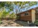 Exterior showcasing a wood deck and mature trees in the backyard at 3901 Villas Green Cir # 1, Longwood, FL 32779