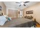 Comfortable bedroom featuring a spacious closet and serene decor at 3901 Villas Green Cir # 1, Longwood, FL 32779