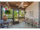 Screened porch with comfortable seating and relaxing outdoor view at 3901 Villas Green Cir # 1, Longwood, FL 32779
