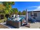 Backyard with a pool and multiple seating areas at 427 Zimmerman Dr, Orlando, FL 32839