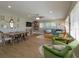 Bright and airy living space features hardwood floors, large windows, modern furnishings, and open layout at 427 Zimmerman Dr, Orlando, FL 32839