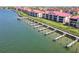 Beautiful view of waterfront condos with docks along the shoreline at 434 Bouchelle Dr # 202, New Smyrna Beach, FL 32169