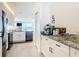 Modern kitchen with granite counters and stainless appliances at 434 Bouchelle Dr # 202, New Smyrna Beach, FL 32169