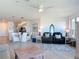 Open-concept living space featuring modern decor, lots of light, and an eat-in kitchen at 434 Bouchelle Dr # 202, New Smyrna Beach, FL 32169