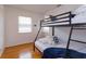 Second bedroom with bunk beds, nautical themed decorations and wood floors at 476 Zelda Blvd, Daytona Beach, FL 32118