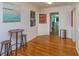 Dining area with hardwood floors, bar-height table and a window at 476 Zelda Blvd, Daytona Beach, FL 32118