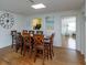 Dining room with seating for eight and view to kitchen and living room at 476 Zelda Blvd, Daytona Beach, FL 32118